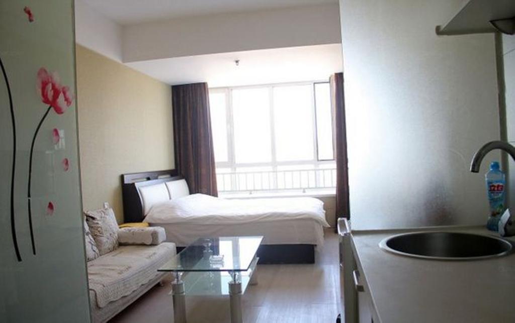 Lanting Serviced Apartment Qingdao Cbd الغرفة الصورة
